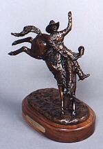 A Fist Full of Bucks - bronze by sculptor Susan Lynes