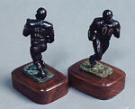 Football Player - bronze by sculptor Susan Lynes