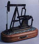 Pumpin Black Gold - bronze by sculptor Susan Lynes